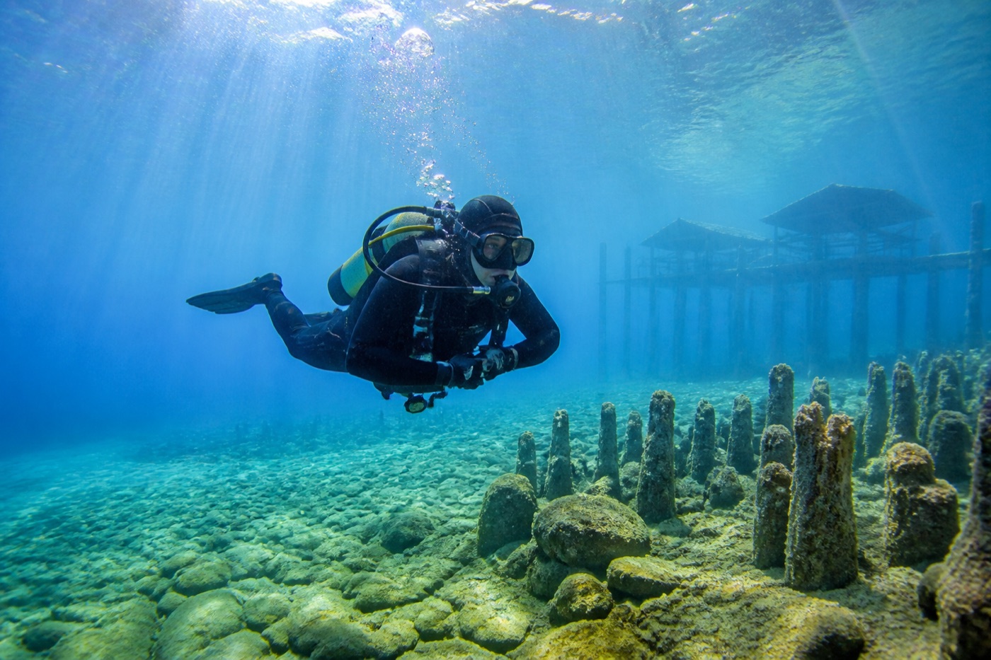 Scuba diver exploring beneath the surface of Lake Ohrid